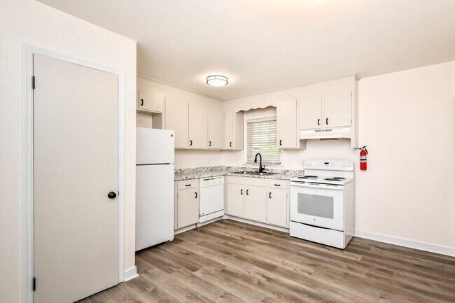 Building Photo - Tour Today! Beautiful redesigned corner co...