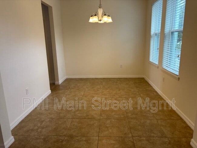 Building Photo - 8130 Red Stopper Ln