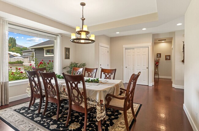 Building Photo - 3-bedroom, 2-bathroom home featuring an op...