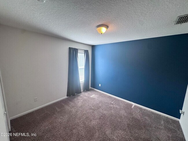 Building Photo - 15373 Bareback Dr