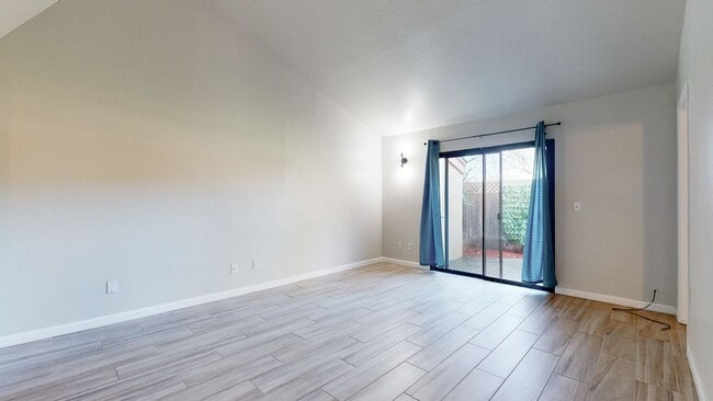 Building Photo - Spacious and Bright 1 Bedroom 1 Bath end unit at Redwood Village!