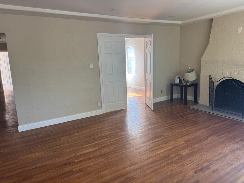 living room with fireplace, will update with better pictures - 10821 Otsego St