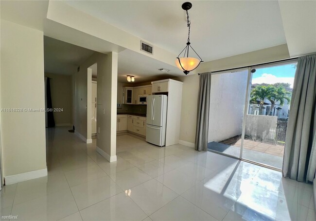 Building Photo - 3 br, 2.5 bath Condo - 8625 SW 152nd Ave A...