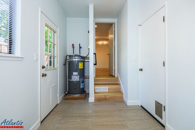 Building Photo - Beautiful Townhouse | Remodeled | Private ...