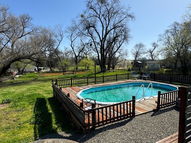 Building Photo - Home on 1 acre lot with above ground pool