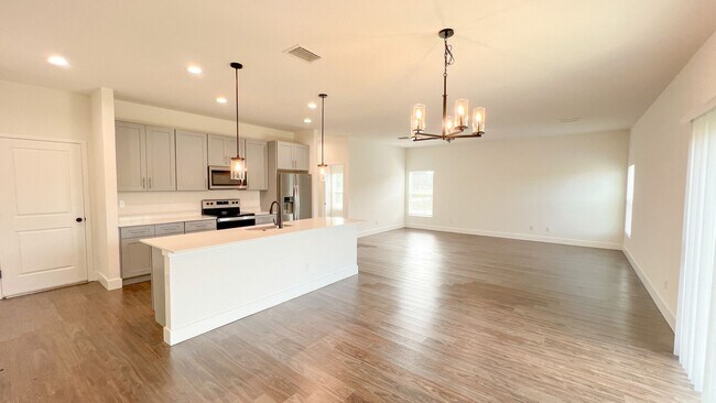 Building Photo - AVAILABLE NOW! 4 BD/2BA Home in Beautiful Palm Bay!! Wonderful home ready for move-in.