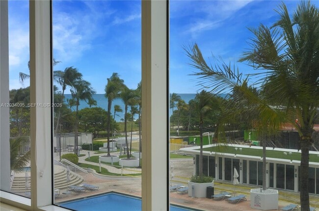 Building Photo - 10275 Collins Ave
