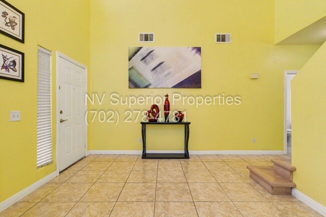 Building Photo - NW!! 4 Bedrooms!!! All Tile and Pergo flooring T/O!! NO Carpet!!! Low Maintenance Desert landscap...