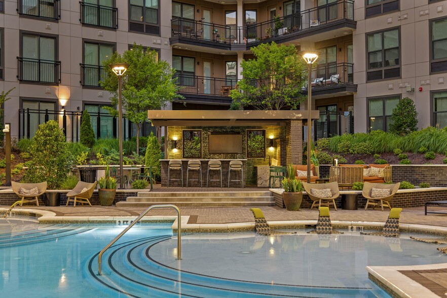 Resort-style Swimming Pool with Tanning Ledge, Cabanas and Sundeck - Bexley Chamblee
