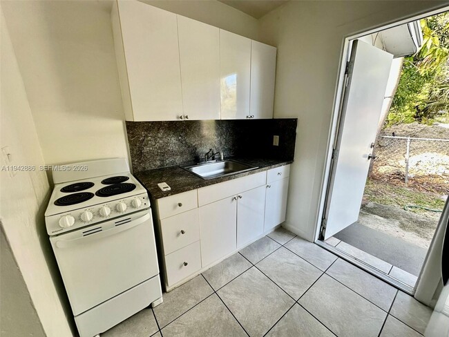 Building Photo - 5010 NW 2nd Ave