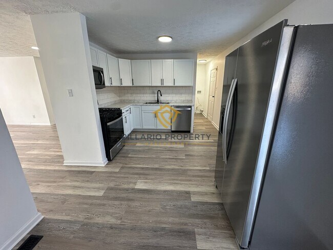 Building Photo - Spacious & Updated 4BR/2BA Home Near Holliday Park — Move-In Ready!