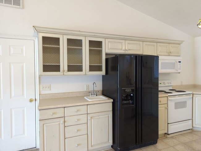 Building Photo - Charming 2-Bedroom + Office Home with Spacious Layout & Serene Backyard. Access to Community Pool...