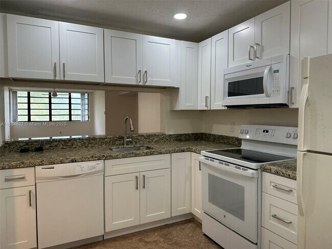 Building Photo - 3150 NW 42nd Ave