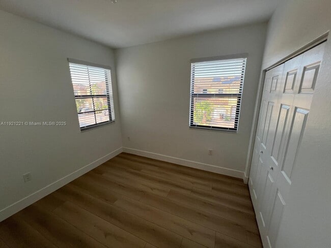 Building Photo - 9399 W 33rd Ln