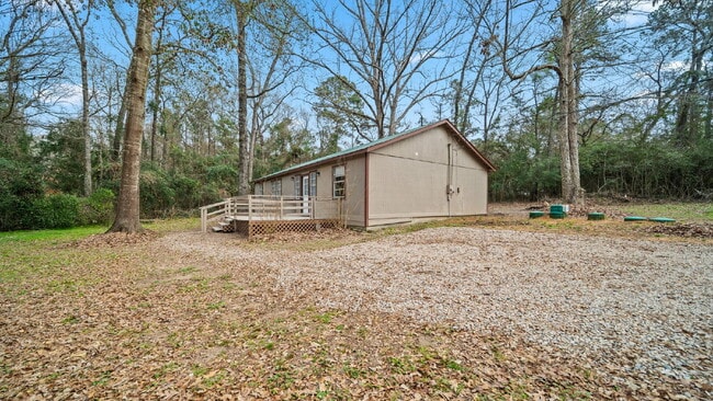 Building Photo - Rural, wooded living in this 4 bedroom, 2 full bath home on just under a quarter of an acre. NEW ...