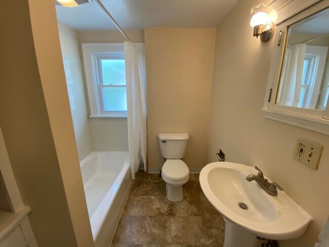 Building Photo - Warm & Bright West Akron 3BR with Fireplace, Off-Street Parking & Backyard