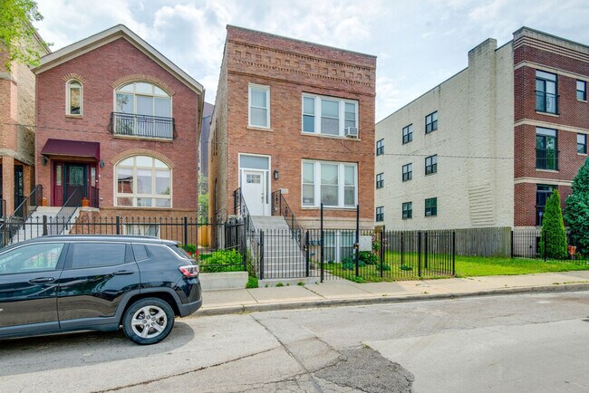 Building Photo - 4241 S Langley Ave