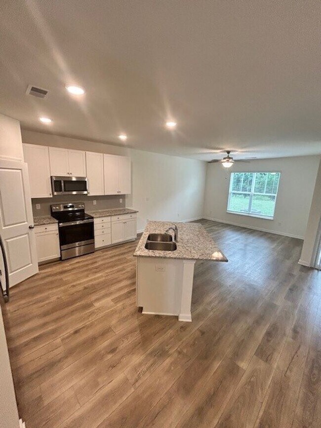 Building Photo - Your New Home Awaits — Enjoy 1 Month FREE at Arbor Mill