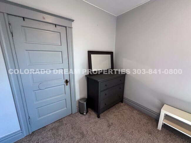 Building Photo - A home where old-world charm meets modern sophistication!