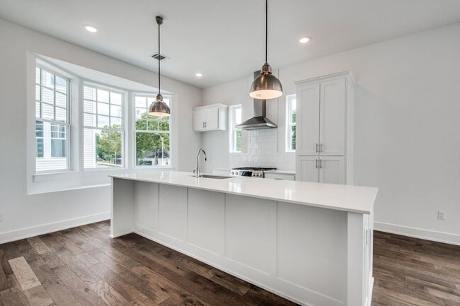 Building Photo - Welcome to a beautiful Craftsman-style Tow...