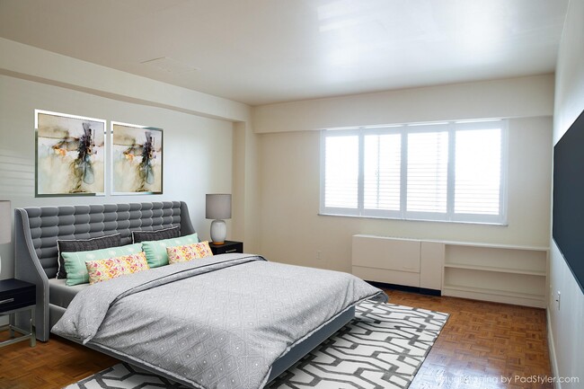 Unit #103 - Bedroom 1 VIRTUAL STAGED - 1617 E Mcmillan St