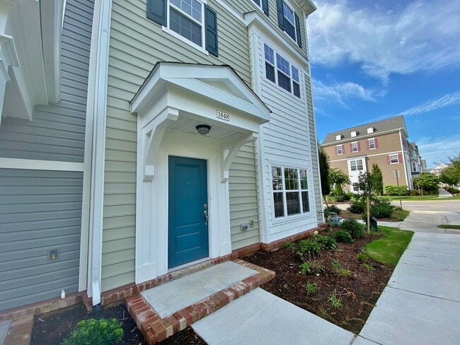 Building Photo - 3 Bedroom Townhome in Spence Crossing! Water/Sewer/Trash/Landscaping INCLUDED! - Attached Garage ...