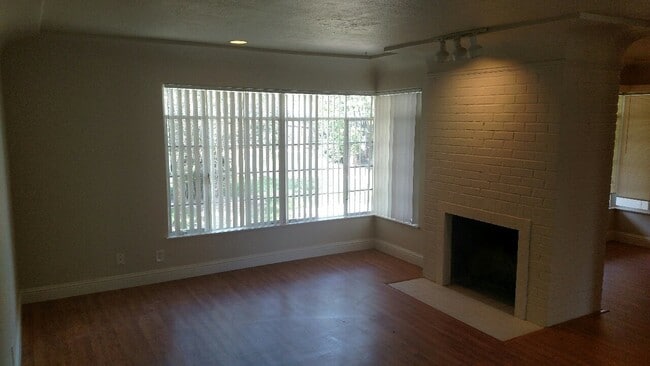 Building Photo - STOP BY, PEEK THROUGH THE WINDOWS AND EXPL...