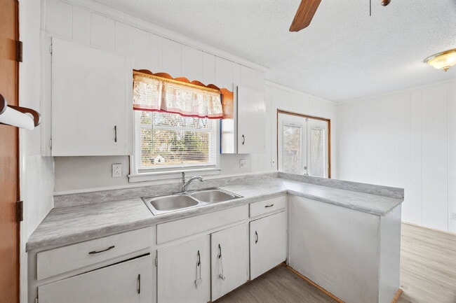 Building Photo - Classic Brick Ranch with 24x24 Workshop, Fenced Yard & Garden Beds