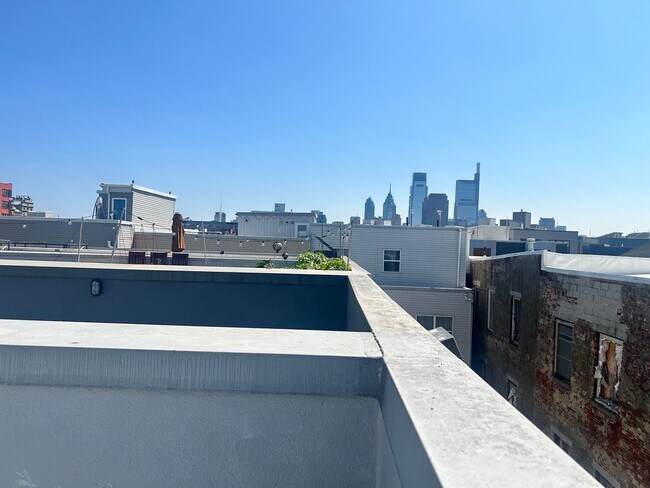 Building Photo - Beautiful Condo with Amazing Roof Top Deck