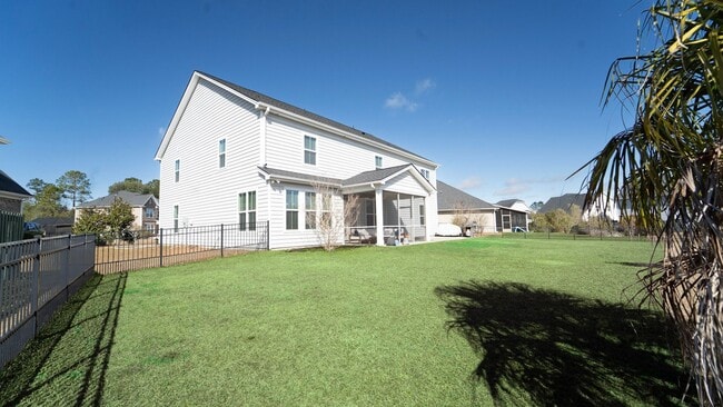 Building Photo - Elegant Richmond Hill Home with Screened Patio & Lagoon Views