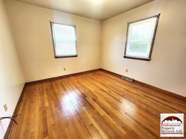 Building Photo - Charming Brick Rancher Offers A Perfect Blend Of Country Living And Convenience