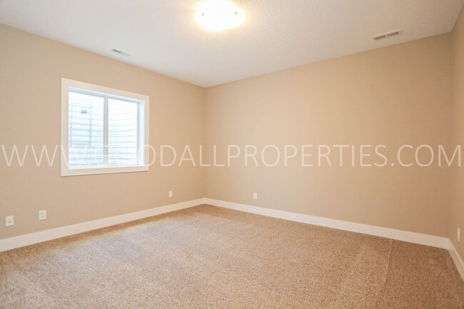 Building Photo - 4-Bedroom Ranch Home with Finished Basement & 3-Car Garage