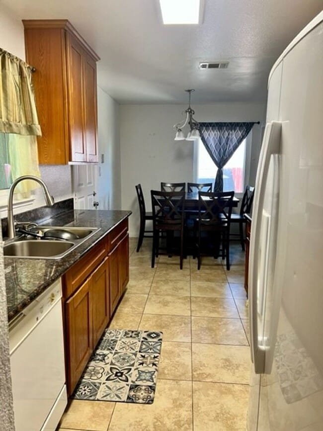 Building Photo - Available Now  4 Bedroom 2 bath home