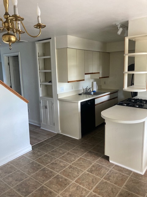 Kitchen from dining area - 33 Van Zandt Ave