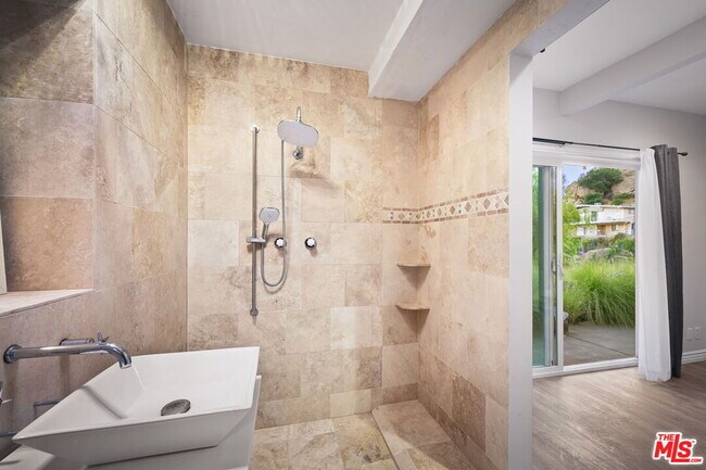 Building Photo - 8657 Valley Flores Dr