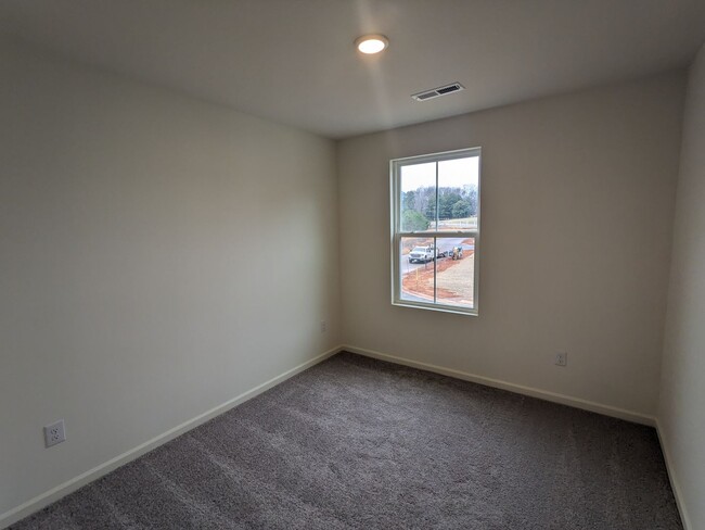 Building Photo - Brand New Corner Unit 3 Bedroom Townhome i...