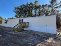 Building Photo - NEW 3 BEDROOM 2 BATH SINGLEWIDE MOBILE HOME LOCATED IN EAGLE SPRINGS! $1,300 RENT $1,300 DEPOSIT