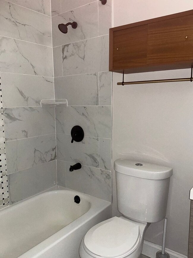 Building Photo - Fully updated 4BR 3BA single family rambler in Twinbrook Forest