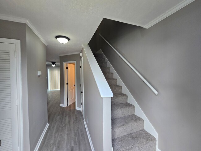 Building Photo - Welcome to Your Stylish New Townhome!