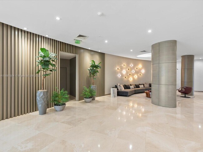 Building Photo - 10275 Collins Ave
