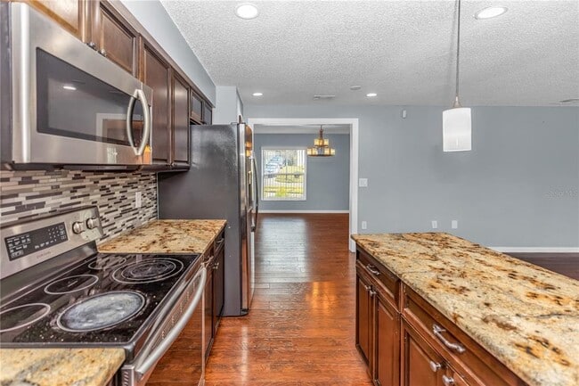 Building Photo - 8315 Village Green Rd