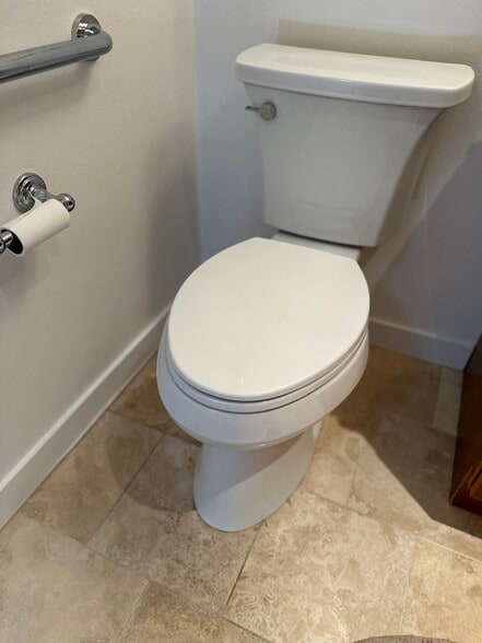 New tall toilets - 421 Olohana St