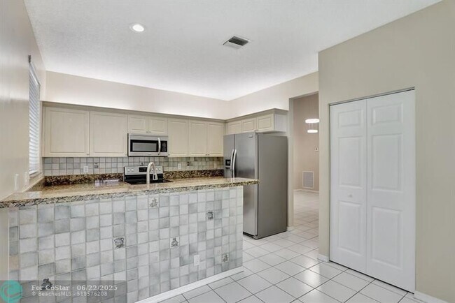 Building Photo - 6455 NW 78th Dr