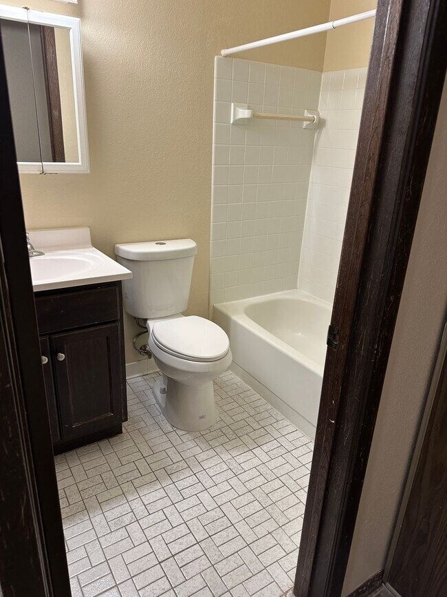 Building Photo - One Bedroom with Walk Out Patio