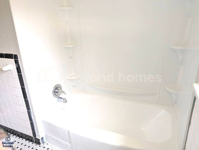 Building Photo - Updated Bungalow with Massive Deck and Fully Fenced Yard!