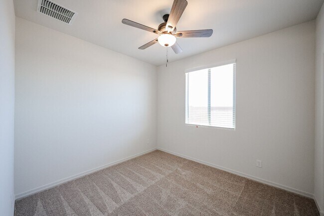 Building Photo - New 4 Bedroom + Den Home in Asante Community