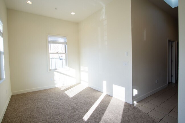 Building Photo - Corner 2 Bedroom with DW, W/D, Fireplace + Juliette Balcony!