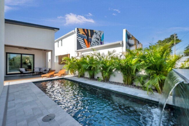 Building Photo - Luxury Living in Grand Central District: Exquisite Furnished Home with Pool