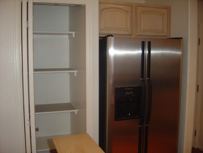 pantry and refrigerator - 4147 Outlook Blvd
