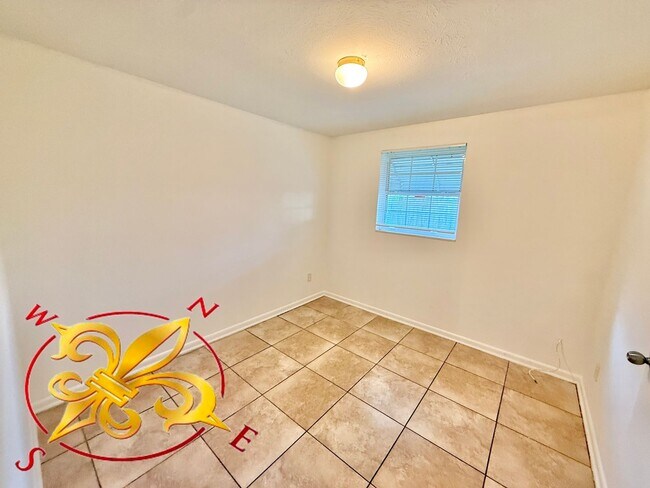 Building Photo - Spacious 4-Bedroom Home with Dual Living A...